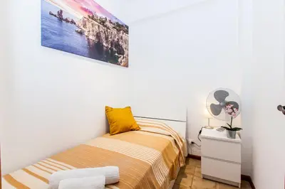 Letto o letti in una camera di SICILIA ETNA MARE Beach&Pool Catania Taormina Etna District
