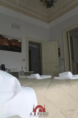 Letto o letti in una camera di A 2 Passi da Stesicoro Suite Catania