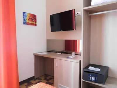 TV o dispositivi per l'intrattenimento presso Hotel Etnea Royal Suites
