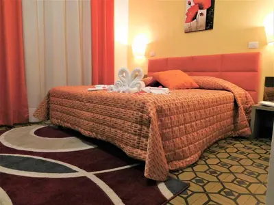Letto o letti in una camera di Hotel Etnea Royal Suites