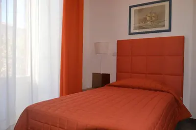 Letto o letti in una camera di Hotel Etnea Royal Suites