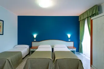 Letto o letti in una camera di Atlantis Palace Hotel