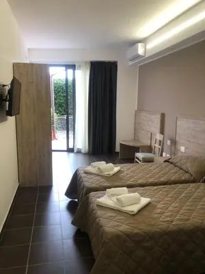 Letto o letti in una camera di Atlantis Palace Hotel