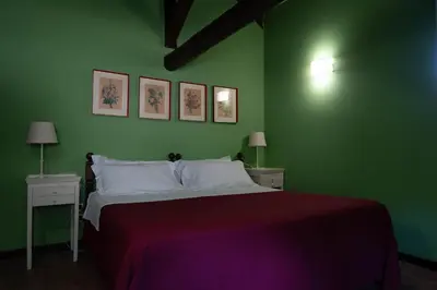 Letto o letti in una camera di Hotel Villa Dorata