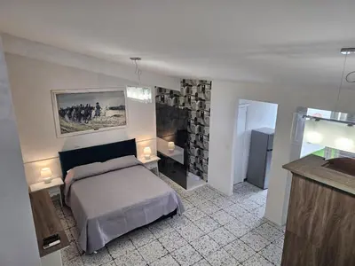 Letto o letti in una camera di Terrazza Siciliana
