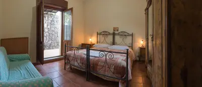Letto o letti in una camera di Biologico Dell'Etna