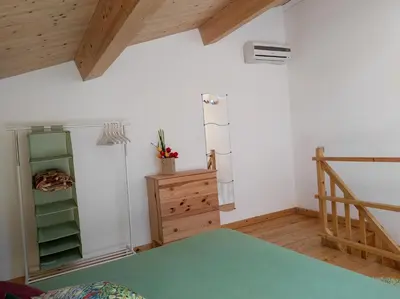 Letto o letti in una camera di Il Borghetto di Gigi