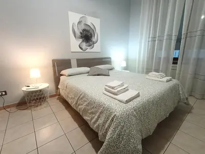 Letto o letti in una camera di Puccini apartment
