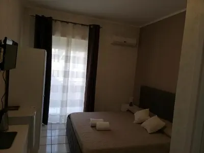 Letto o letti in una camera di B & B AMICI DELL'ETNA