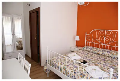 Letto o letti in una camera di Tosca B&B