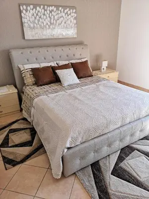 Letto o letti in una camera di Casa Donna Rosaria tra Etna e Taormina