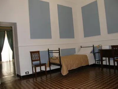 Letto o letti in una camera di Il Gattopardo House
