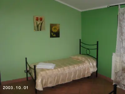 Letto o letti in una camera di La Porta Dell'Etna - Nicolosi