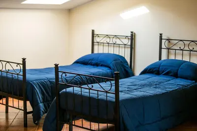 Letto o letti in una camera di Gli Ulivi Dell'Etna