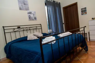 Letto o letti in una camera di Gli Ulivi Dell'Etna