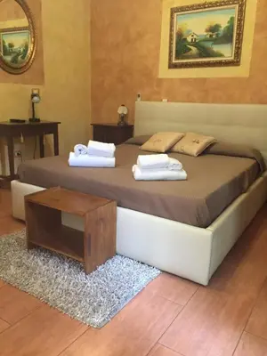 Letto o letti in una camera di B&B Etna House