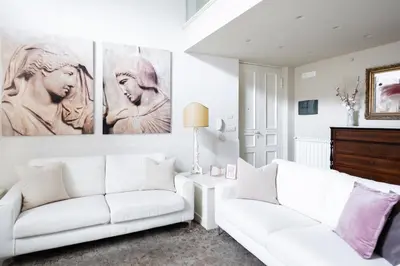 Area soggiorno di B Sicilian Charming Stay - Luxury Loft Catania