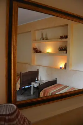 Letto o letti in una camera di B&B Notti E Dintorni
