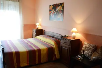 Letto o letti in una camera di B&B Notti E Dintorni