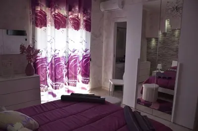 Letto o letti in una camera di Il Cuore dell'Etna