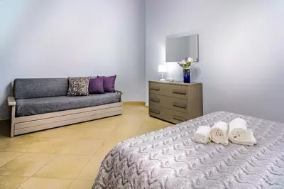 Letto o letti in una camera di CASA ZU' SARU