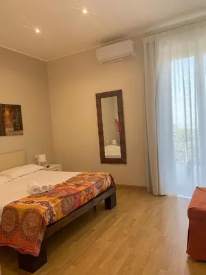 Letto o letti in una camera di B&B Villa Etelka