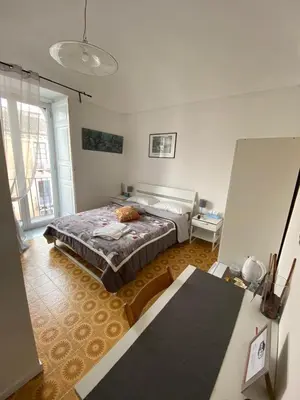 Letto o letti in una camera di The Artist's Home Catania Centro