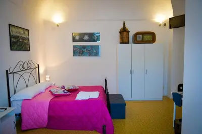 Letto o letti in una camera di The Artist's Home Catania Centro