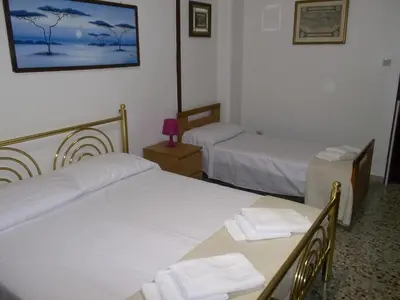 Letto o letti in una camera di Victoria