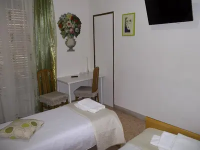 Letto o letti in una camera di Victoria