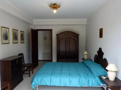 Letto o letti in una camera di Villa Marianna