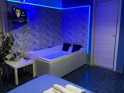 Letto o letti in una camera di Etnea Glamour House