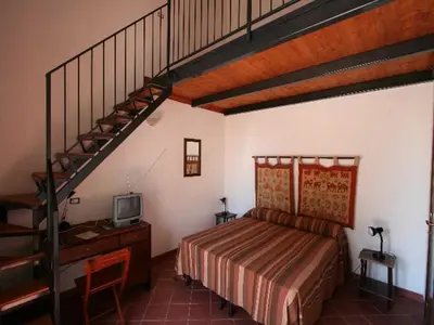 Letto o letti in una camera di Baglio Delle Rose