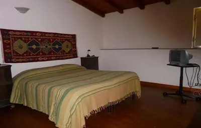Letto o letti in una camera di Baglio Delle Rose
