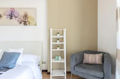 Letto o letti in una camera di La casa di carta in piazza stesicoro