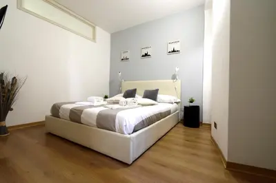 Letto o letti in una camera di La casa di carta in piazza stesicoro