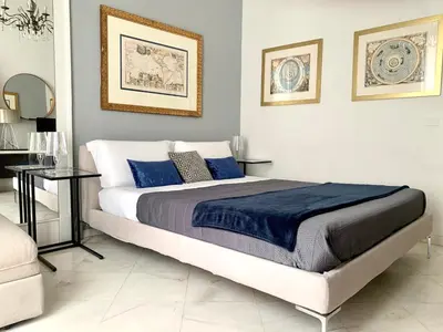 Letto o letti in una camera di Casa del corso