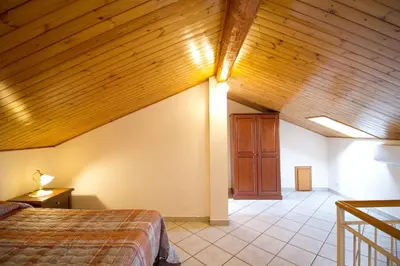 Letto o letti in una camera di Etna Villa Alba Chiara