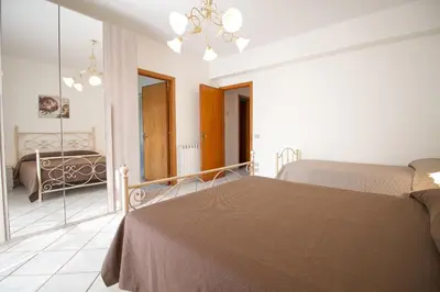 Letto o letti in una camera di Etna Villa Alba Chiara