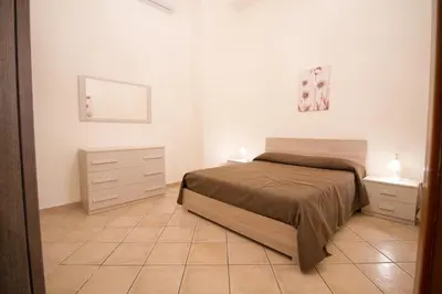 Letto o letti in una camera di Etna Villa Alba Chiara