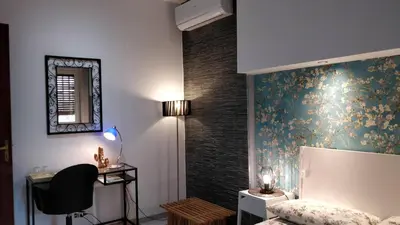 Letto o letti in una camera di Suite time Van Gogh