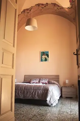 Letto o letti in una camera di Casa Antonella