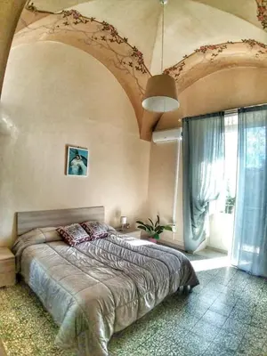 Letto o letti in una camera di Casa Antonella