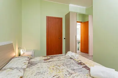 Letto o letti in una camera di Seaside&City