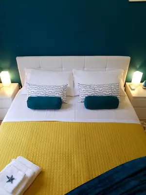 Letto o letti in una camera di Corte Degli Aranci House