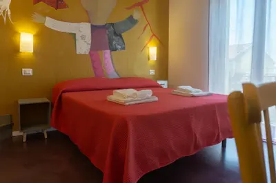 Letto o letti in una camera di Kartè
