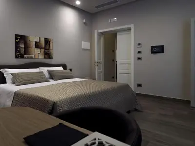 Letto o letti in una camera di Relais Anfitheatro