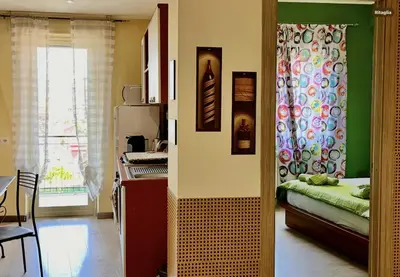 Letto o letti in una camera di Talya Catania