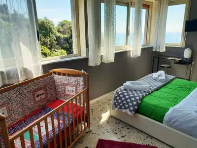 Letto o letti in una camera di La mia seconda casa ad Aci Castello