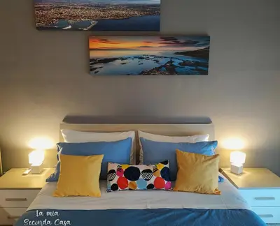 Letto o letti in una camera di La mia seconda casa ad Aci Castello